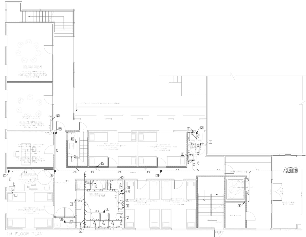 First floor sanitary plan with waste and vent piping, cleanouts and the connection to the existing sewer. Three-storey residential care facility with offices, California, MEP design by Ahmad Akra